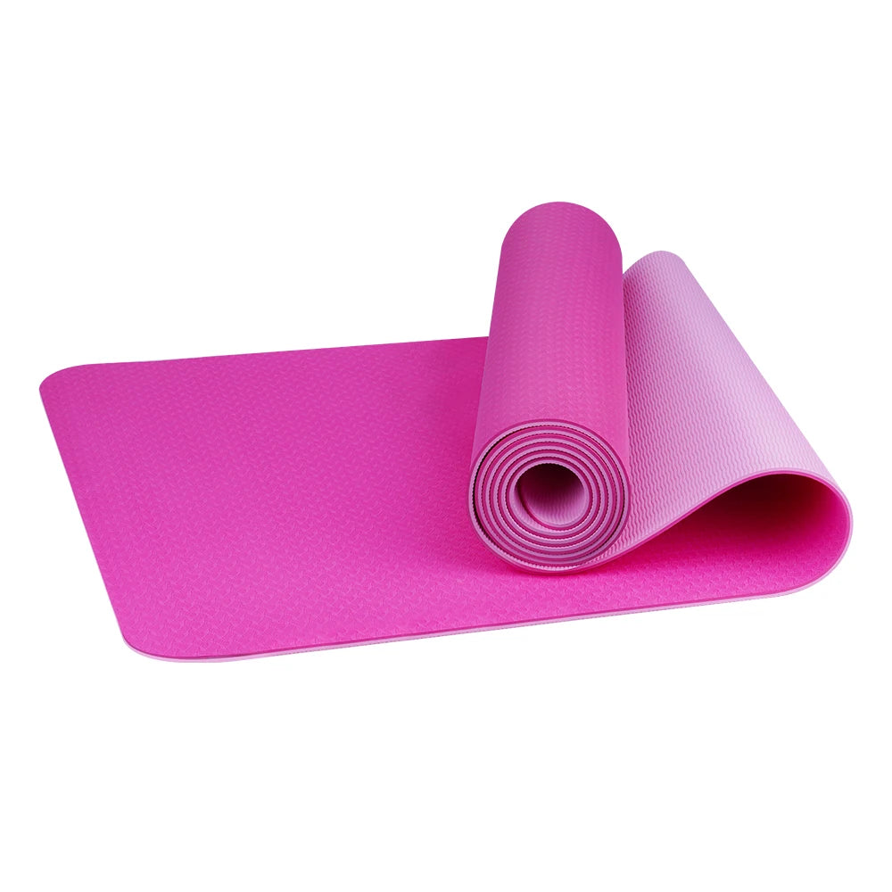 A collection of yoga mats in various solid colors, including pink, purple, green, orange, and yellow, rolled up and placed both vertically and horizontally. A detailed close-up of a single orange yoga mat with a textured surface is also shown.