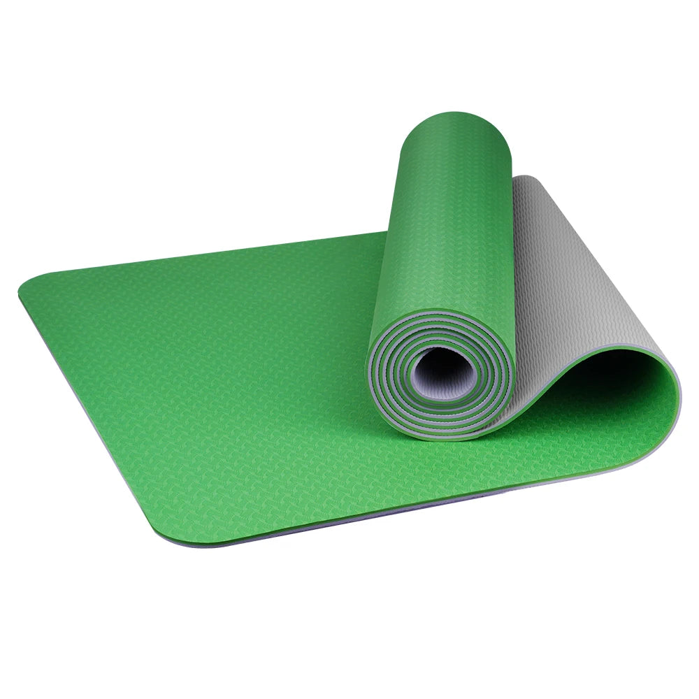 A collection of yoga mats in various solid colors, including pink, purple, green, orange, and yellow, rolled up and placed both vertically and horizontally. A detailed close-up of a single orange yoga mat with a textured surface is also shown.